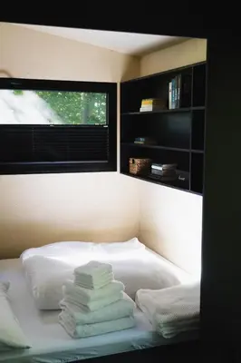 Ein Bett oder Betten in einem Zimmer der Unterkunft Tiny House für Naturliebhaber & Entdecker