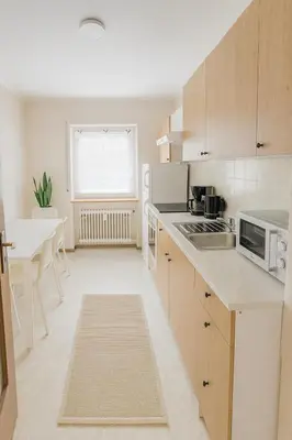 Küche/Küchenzeile in der Unterkunft SUNNYHOME Monteurwohnungen und Apartments in Weiden