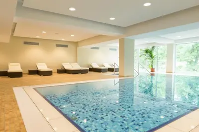 Der Swimmingpool an oder in der Nähe von Aribo Hotel