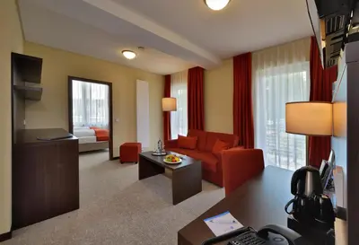 Ein Sitzbereich in der Unterkunft Aribo Hotel