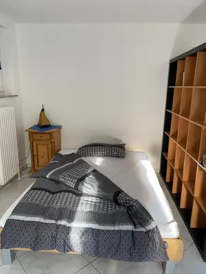 Ein Bett oder Betten in einem Zimmer der Unterkunft BT-Meyernberg