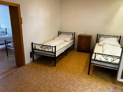 Ein Bett oder Betten in einem Zimmer der Unterkunft Monteur Unterkunft in Helmbrechts