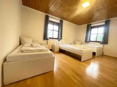 Ein Bett oder Betten in einem Zimmer der Unterkunft SAD261 große Monteurwohnung