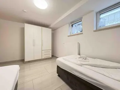 Ein Bett oder Betten in einem Zimmer der Unterkunft STB115 praktische Monteurwohnung