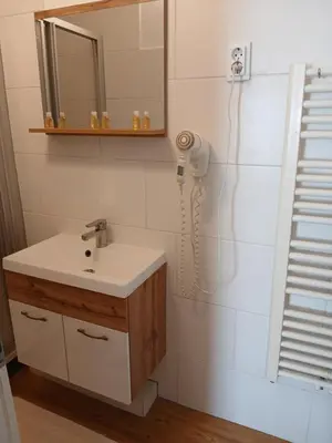 Ein Badezimmer in der Unterkunft Doppelbett Zimmer