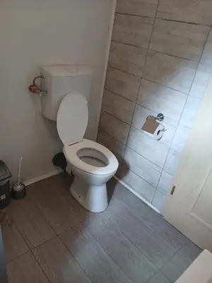 Ein Badezimmer in der Unterkunft 2-Bett Zimmer