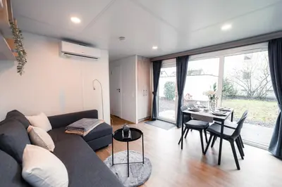 Ein Sitzbereich in der Unterkunft Tiny House mit Terrasse und Garten in Altstadtnähe inkl Parkplatz