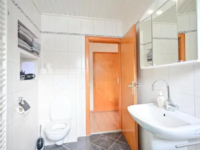 Ein Badezimmer in der Unterkunft Bärenhöhle