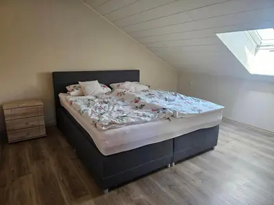 Ein Bett oder Betten in einem Zimmer der Unterkunft Ferienwohnung Naabtalblick
