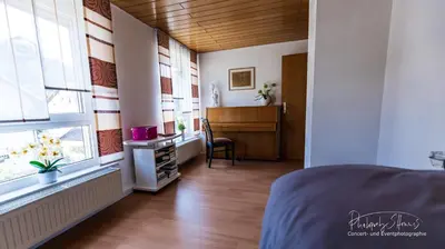 Ein Bett oder Betten in einem Zimmer der Unterkunft Ferienwohnung an der Wilden Rodach