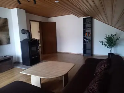 Ein Sitzbereich in der Unterkunft Ferienwohnung am Pinzigberg
