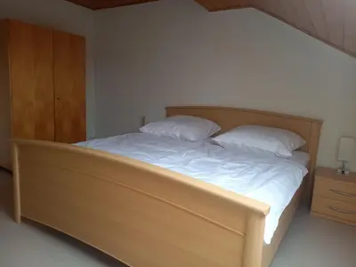 Ein Bett oder Betten in einem Zimmer der Unterkunft Ferienwohnung am Pinzigberg