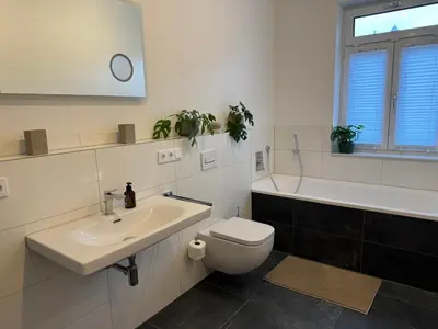 Ein Badezimmer in der Unterkunft Zentrale Citywohnung Bayreuth, Loggia, Garage