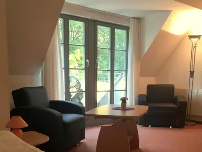 Ein Sitzbereich in der Unterkunft Sonnenhof
