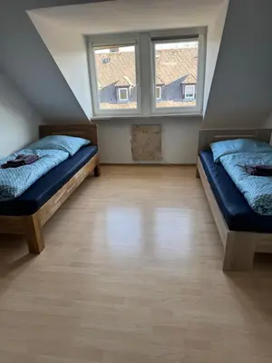 Ein Bett oder Betten in einem Zimmer der Unterkunft Leimitzer