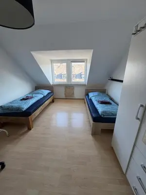 Ein Bett oder Betten in einem Zimmer der Unterkunft Leimitzer