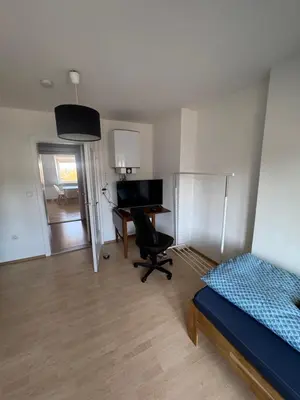 Ein Bett oder Betten in einem Zimmer der Unterkunft Leimitzer