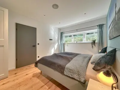 Ein Bett oder Betten in einem Zimmer der Unterkunft Wolfring