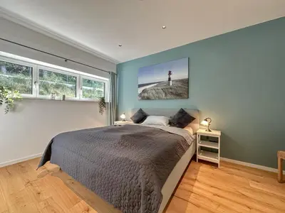 Ein Bett oder Betten in einem Zimmer der Unterkunft Wolfring