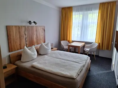 Ein Bett oder Betten in einem Zimmer der Unterkunft Pension Kursprung