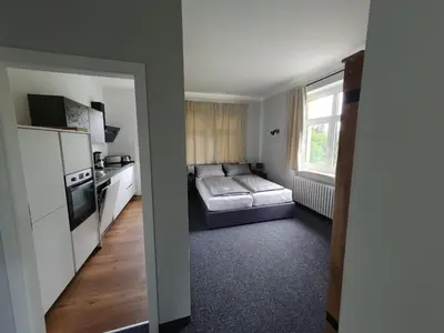 Ein Bett oder Betten in einem Zimmer der Unterkunft Pension Kursprung