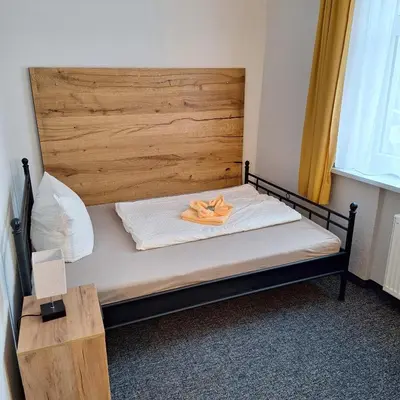 Ein Bett oder Betten in einem Zimmer der Unterkunft Pension Kursprung