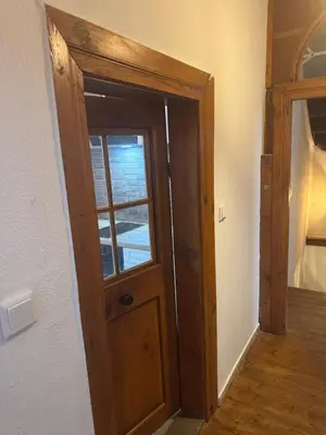 Ein Bett oder Betten in einem Zimmer der Unterkunft Historische Apartment in Haus mit Herz