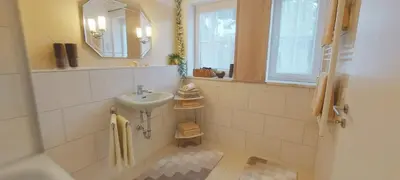 Ein Badezimmer in der Unterkunft FeWoAngela