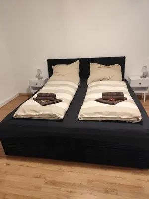 Ein Bett oder Betten in einem Zimmer der Unterkunft Ferienwohnung Nardacchione