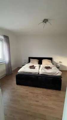 Ein Bett oder Betten in einem Zimmer der Unterkunft Ferienwohnung Nardacchione