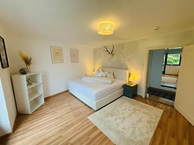 Ein Bett oder Betten in einem Zimmer der Unterkunft Voll ausgestattete und sehr saubere Ferienwohnung zu vermieten