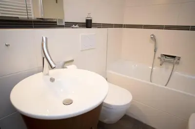 Ein Badezimmer in der Unterkunft Meisterhaus Ferienwohnung Bayreuth