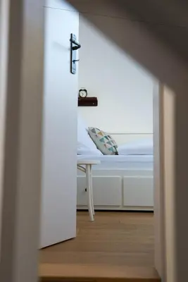 Ein Bett oder Betten in einem Zimmer der Unterkunft Meisterhaus Ferienwohnung Bayreuth