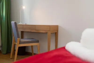 Ein Bett oder Betten in einem Zimmer der Unterkunft Meisterhaus Ferienwohnung Bayreuth