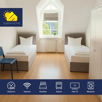 Ein Bett oder Betten in einem Zimmer der Unterkunft SUNNYHOME Monteurwohnungen und Apartments in Schwandorf