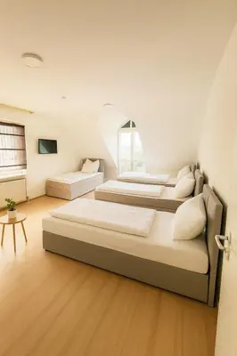 Ein Bett oder Betten in einem Zimmer der Unterkunft SUNNYHOME Monteurwohnungen und Apartments in Schwandorf
