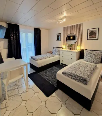 Ein Bett oder Betten in einem Zimmer der Unterkunft Family Suite del Pueblo
