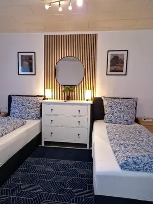 Ein Bett oder Betten in einem Zimmer der Unterkunft Family Suite del Pueblo