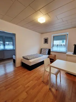 Ein Bett oder Betten in einem Zimmer der Unterkunft Family Suite del Pueblo
