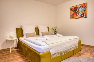 Ein Bett oder Betten in einem Zimmer der Unterkunft Krumpes Quarters