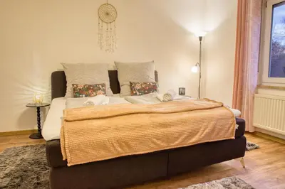Ein Bett oder Betten in einem Zimmer der Unterkunft Krumpes Quarters