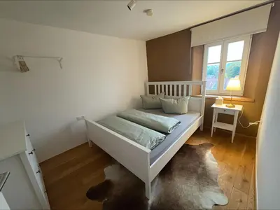 Ein Bett oder Betten in einem Zimmer der Unterkunft Schlossblick