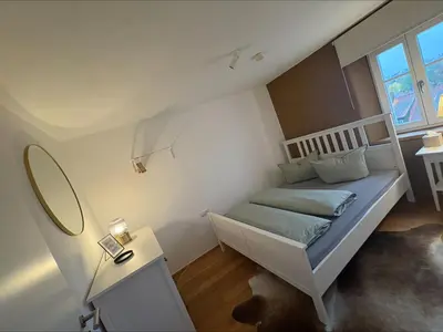 Ein Bett oder Betten in einem Zimmer der Unterkunft Schlossblick