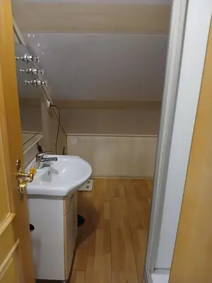 Ein Badezimmer in der Unterkunft Doppelbett Zimmer plus Zustelbett