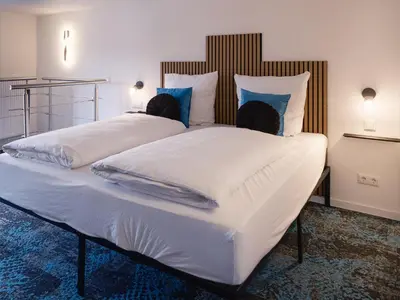 Ein Bett oder Betten in einem Zimmer der Unterkunft Das Hartmanns
