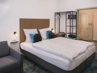 Ein Bett oder Betten in einem Zimmer der Unterkunft Das Hartmanns