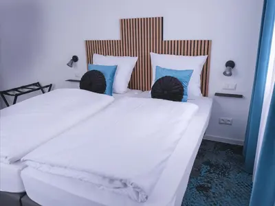 Ein Bett oder Betten in einem Zimmer der Unterkunft Das Hartmanns