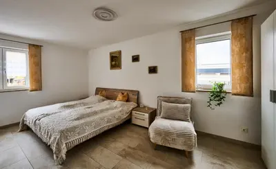 Ein Bett oder Betten in einem Zimmer der Unterkunft Ferienwohnung Kümmersbruck