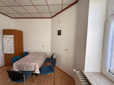 Ein Sitzbereich in der Unterkunft Ferienwohnung Goldener Drache