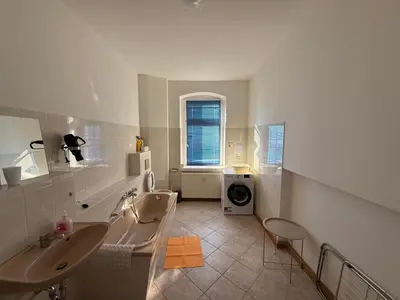 Ein Sitzbereich in der Unterkunft Ferienwohnung Goldener Drache